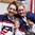 ZLIN, CZECH REPUBLIC - JANUARY 14: USA's Jesse Compher #14 and Emily Oden #21 celebrate with their gold medals during gold medal game action against Canada at the 2017 IIHF Ice Hockey U18 Women's World Championship. (Photo by Andrea Cardin/HHOF-IIHF Images)